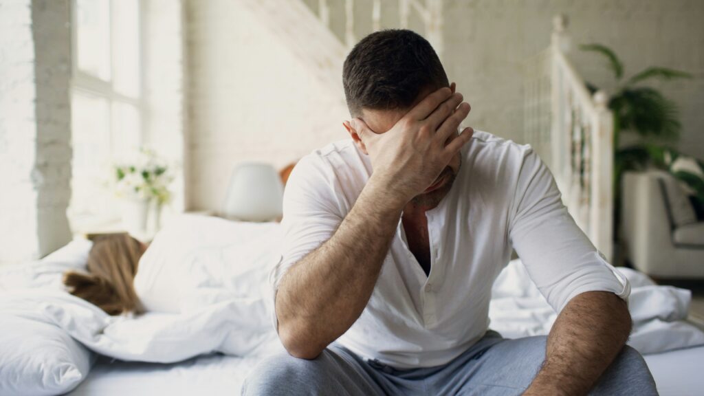 cheap sildenafil - Man-Sitting-On-Bed-Sad