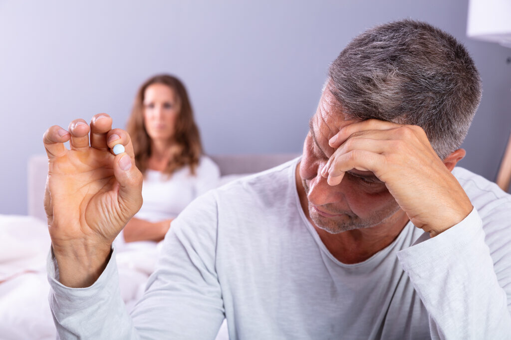 cheap tadalafil - Man-Suffering-From-Erectile-Dysfunction-Holding-Pill-In-Hand